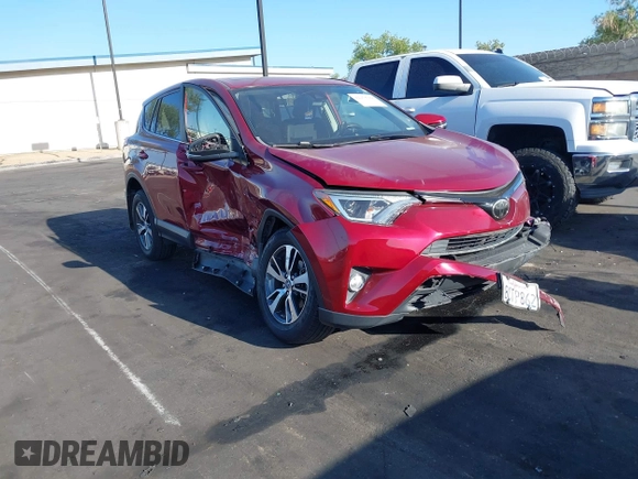 2018 Toyota RAV4 XLE with VIN JTMWFREV6JD117500, listed as a IAAI auction lot 42258588 with Not provided miles and . Bid and sale history available at DreamBid. Image 1.