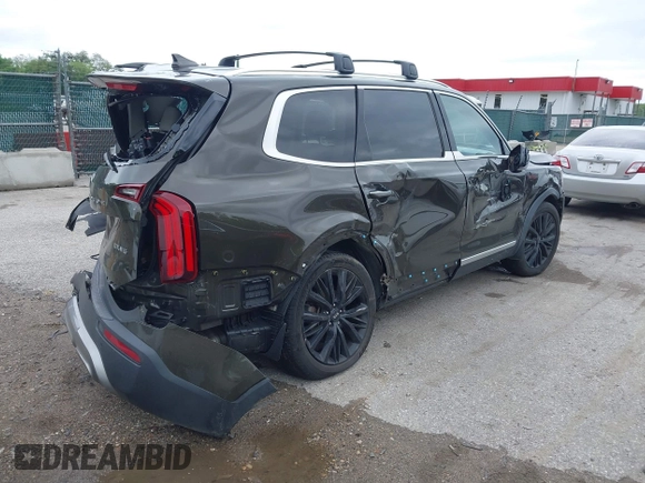 2020 Kia Telluride SX with VIN 5XYP5DHC8LG079664, listed as a IAAI auction lot 42222352 with 98,348 mi miles and . Bid and sale history available at DreamBid. Image 4.
