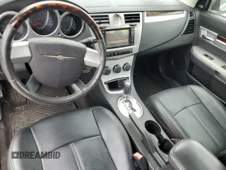 2010 Chrysler Sebring Limited z VIN 1C3BC6EV5AN144868, wystawiony jako Copart lot #66549774 z przebiegiem 106 602 mil mil oraz Szkoda całkowita • Salvage title. Historia ofert i sprzedaży dostępna na DreamBid. Obrazek 8.