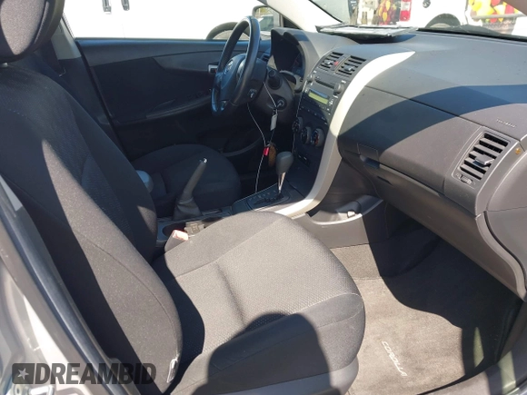 2009 Toyota Corolla with VIN 1NXBU40E69Z045543, listed as a IAAI auction lot 42201200 with 143,533 mi miles. Bid and sale history available at carsss.com. Image 5.