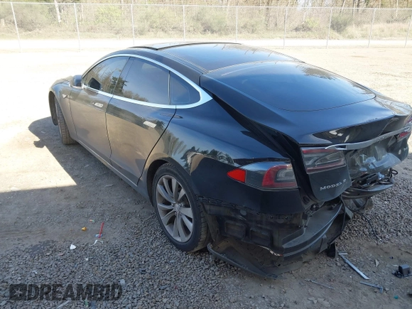 2014 Tesla Model S 60 z VIN 5YJSA1H19EFP45024, wystawiony jako IAAI lot #41960222 z przebiegiem 108 573 mil mil oraz . Historia ofert i sprzedaży dostępna na DreamBid. Obrazek 3.