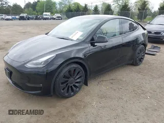 2023 Tesla Model Y Performance z VIN 7SAYGDEF7PF663387, wystawiony jako IAAI lot #42129258 z przebiegiem 42 691 mil mil oraz . Historia ofert i sprzedaży dostępna na DreamBid. Obrazek 18.