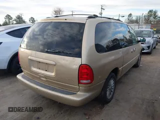 1999 Chrysler Town & Country LXi with VIN 1C4GP54L8XB612991, listed as a IAAI auction lot 41669165 with 199,327 mi miles and . Bid and sale history available at DreamBid. Image 4.