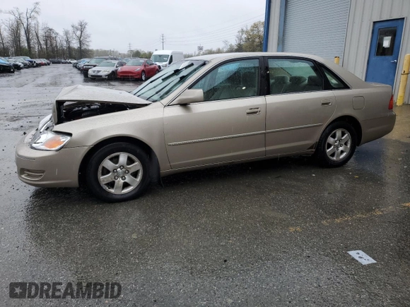 2000 Toyota Avalon XL with VIN 4T1BF28B1YU033159, listed as a Copart auction lot 52796755 with 247,062 mi miles and Salvage Title. Bid and sale history available at DreamBid. Image 1.