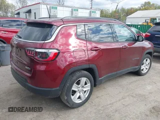 2022 Jeep Compass Latitude with VIN 3C4NJCBB2NT139933, listed as a IAAI auction lot 41886634 with 28,144 mi miles and . Bid and sale history available at DreamBid. Image 4.