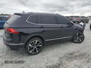 2023 Volkswagen Tiguan SEL R-Line with VIN 3VV4B7AX6PM020956, listed as a Copart auction lot 79680384 with 31,220 mi miles and Salvage title. Bid and sale history available at DreamBid. Image 3.