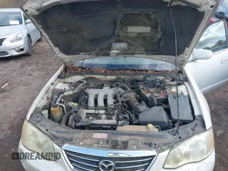 2001 Mazda Millenia z VIN JM1TA221211708077, wystawiony jako IAAI lot #41517393 z przebiegiem 269 771 mil mil oraz . Historia ofert i sprzedaży dostępna na DreamBid. Obrazek 10.