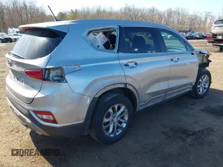 2020 Hyundai Santa Fe SE z VIN 5NMS2CAD7LH269302, wystawiony jako IAAI lot #41833303 z przebiegiem 70 665 mil mil oraz . Historia ofert i sprzedaży dostępna na DreamBid. Obrazek 4.