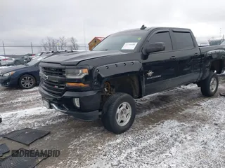 2016 Chevrolet Silverado 1500 LT with VIN 3GCUKREC6GG280645, listed as a IAAI auction lot 41730488 with 144,706 mi miles and . Bid and sale history available at DreamBid. Image 19.
