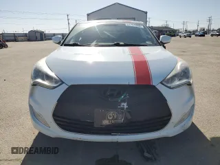 2013 Hyundai Veloster w/Gray Int z VIN KMHTC6ADXDU127194, wystawiony jako Copart lot #51751345 z przebiegiem 122 221 mil mil oraz Szkoda całkowita • Salvage title. Historia ofert i sprzedaży dostępna na DreamBid. Obrazek 5.