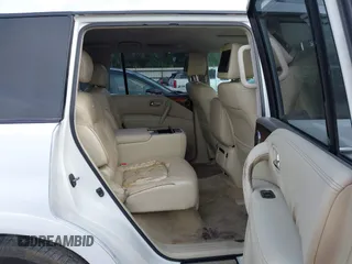 2011 Infiniti QX56 7-passenger with VIN JN8AZ2NF7B9000101, listed as a IAAI auction lot 42004965 with 214,069 mi miles and . Bid and sale history available at DreamBid. Image 8.