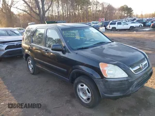 2004 Honda CR-V LX with VIN SHSRD784X4U207801, listed as a IAAI auction lot 41882897 with 246,541 mi miles and . Bid and sale history available at carsss.com. Image 13.