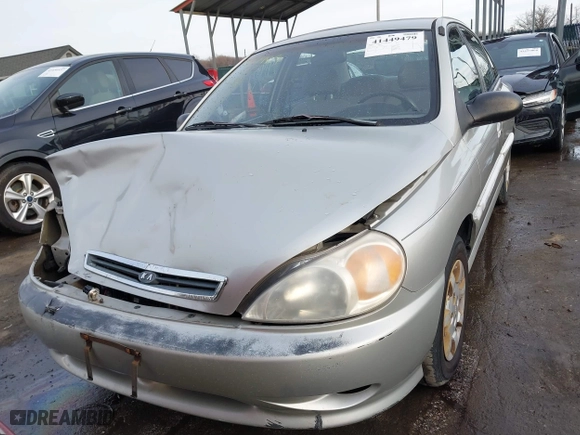 2001 Kia Rio with VIN KNADC123716042067, listed as a IAAI auction lot 41449479 with 113,108 mi miles. Bid and sale history available at carsss.com. Image 12.