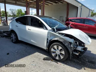 2024 Tesla Model Y Long Range with VIN 7SAYGDEEXRA288960, listed as a Copart auction lot 60801525 with 18,942 mi miles and Salvage title. Bid and sale history available at DreamBid. Image 4.