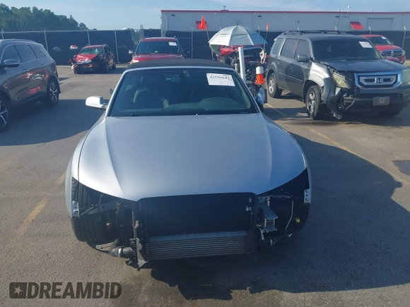2016 Audi A5 Premium with VIN WAUD2AFHXGN005246, listed as a IAAI auction lot 42595647 with 56,602 mi miles and . Bid and sale history available at DreamBid. Image 13.