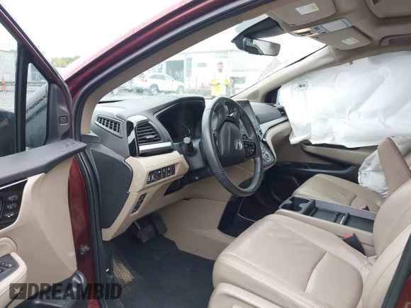 2021 Honda Odyssey Touring with VIN 5FNRL6H88MB006938, listed as a IAAI auction lot 42367022 with 63,280 mi miles and . Bid and sale history available at DreamBid. Image 5.