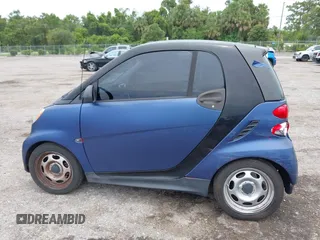 2013 Smart fortwo Pure with VIN WMEEJ3BA6DK664115, listed as a IAAI auction lot 42412198 with 64,522 mi miles and . Bid and sale history available at DreamBid. Image 14.
