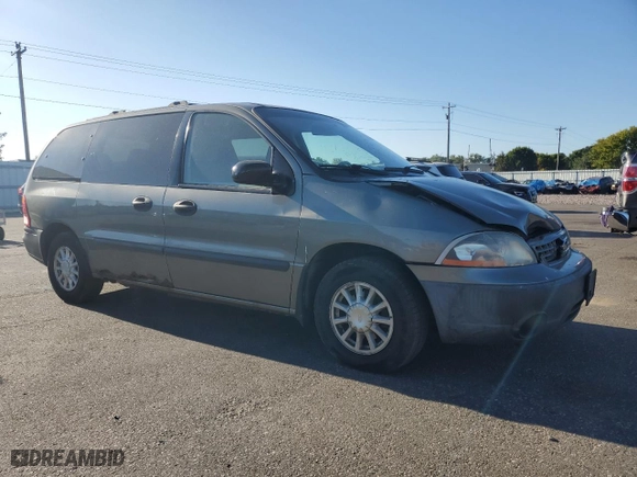 2001 Ford Windstar Wagon LX with VIN 2FMZA51441BA35669, listed as a Copart auction lot 73283214 with 240,538 mi miles and Salvage Title. Bid and sale history available at carsss.com. Image 4.