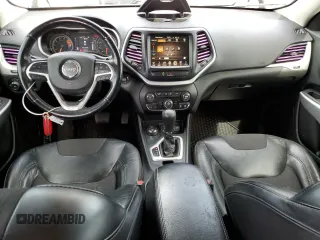 2018 Jeep Cherokee Latitude Plus with VIN 1C4PJMLX0JD562180, listed as a Copart auction lot 57631285 with 105,923 mi miles and Salvage title. Bid and sale history available at DreamBid. Image 8.