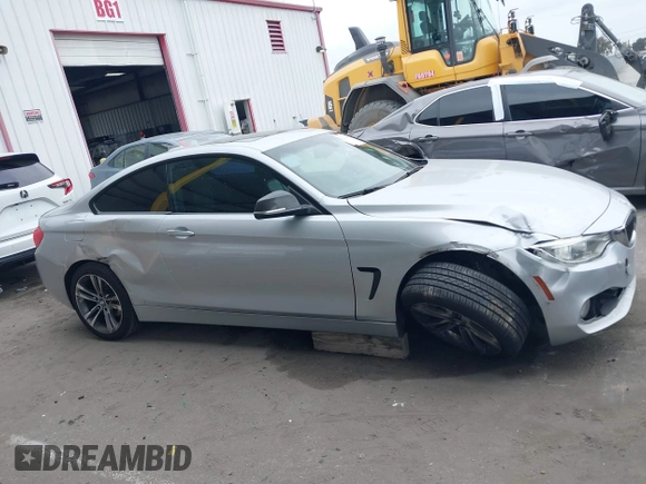 2015 BMW 4 Series 428i z VIN WBA3N7C50FK222398, wystawiony jako IAAI lot #42211723 z przebiegiem 149 853 mil mil oraz . Historia ofert i sprzedaży dostępna na DreamBid. Obrazek 13.