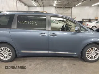 2016 Toyota Sienna XLE with VIN 5TDYK3DC3GS747411, listed as a IAAI auction lot 42289072 with 184,546 mi miles and . Bid and sale history available at DreamBid. Image 14.