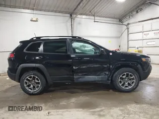 2022 Jeep Cherokee Trailhawk with VIN 1C4PJMBX8ND517236, listed as a IAAI auction lot 41530369 with 34,164 mi miles and . Bid and sale history available at DreamBid. Image 13.