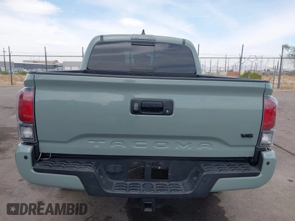 2022 Toyota Tacoma SR with VIN 3TMCZ5AN0NM507320, listed as a IAAI auction lot 42220296 with 33,342 mi miles and . Bid and sale history available at DreamBid. Image 16.