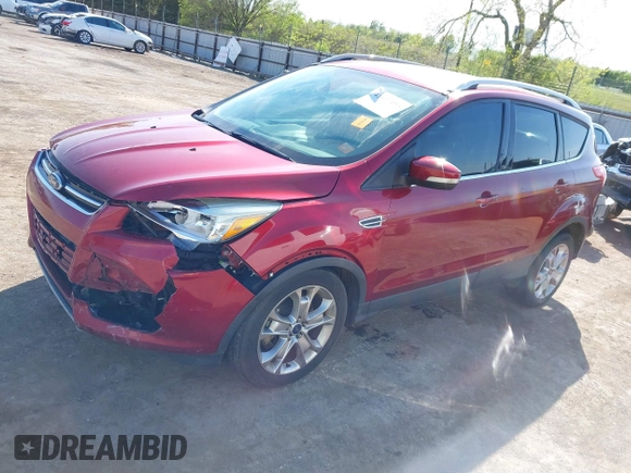 2014 Ford Escape Titanium with VIN 1FMCU0J91EUE12034, listed as a IAAI auction lot 42027493 with 160,417 mi miles and . Bid and sale history available at DreamBid. Image 2.