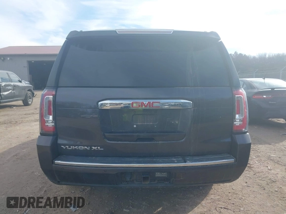2017 GMC Yukon XL Denali with VIN 1GKS2HKJ5HR369939, listed as a IAAI auction lot 41446415 with 159,056 mi miles. Bid and sale history available at carsss.com. Image 16.