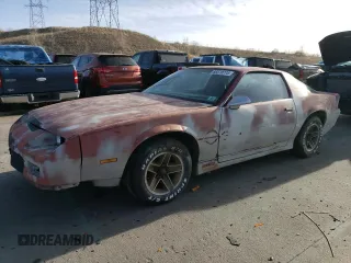 1987 Chevrolet Camaro z VIN 1G1FP21F7HL106467, wystawiony jako Copart lot #85570774 z przebiegiem 31 252 mil mil oraz Szkoda całkowita • Salvage title. Historia ofert i sprzedaży dostępna na DreamBid. Obrazek 1.