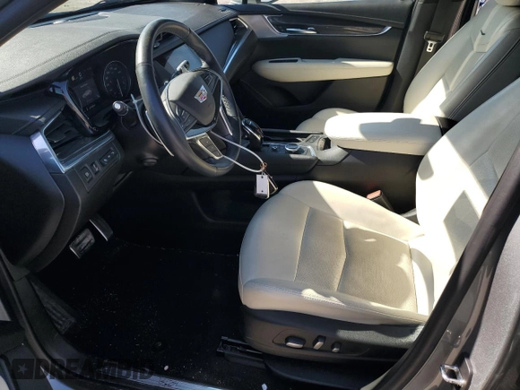 2023 Cadillac XT5 AWD Sport with VIN 1GYKNGRS7PZ133622, listed as a Copart auction lot 48342095 with 63,008 mi miles and Salvage title. Bid and sale history available at DreamBid. Image 7.