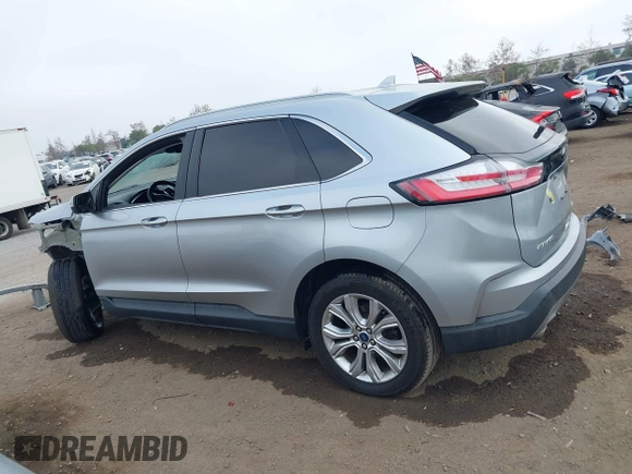 2020 Ford Edge Titanium z VIN 2FMPK4K95LBA16379, wystawiony jako IAAI lot #41190704 z przebiegiem 69 076 mil mil oraz . Historia ofert i sprzedaży dostępna na DreamBid. Obrazek 15.