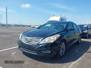 2012 Hyundai Azera with VIN KMHFG4JG0CA138415, listed as a IAAI auction lot 42750561 with 193,993 mi miles and . Bid and sale history available at DreamBid. Image 2.