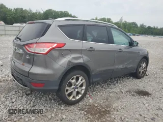 2013 Ford Escape SEL z VIN 1FMCU9HX7DUC11052, wystawiony jako Copart lot #62377515 z przebiegiem 225 704 mil mil oraz Szkoda całkowita • Salvage title. Historia ofert i sprzedaży dostępna na DreamBid. Obrazek 3.