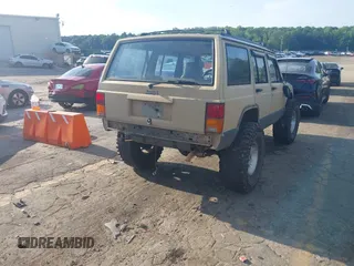 1995 Jeep Cherokee Sport with VIN 1J4FJ68S3SL555908, listed as a IAAI auction lot 42222016 with 283,444 mi miles and . Bid and sale history available at DreamBid. Image 4.