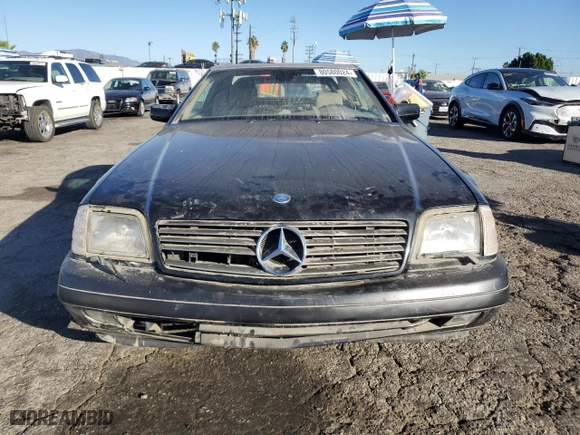 1997 Mercedes-Benz SL-Class with VIN WDBFA63F5VF144026, listed as a Copart auction lot 80580024 with 138,776 mi miles and Clean Title. Bid and sale history available at carsss.com. Image 5.