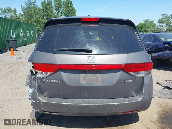 2014 Honda Odyssey Touring with VIN 5FNRL5H90EB082691, listed as a IAAI auction lot 42572977 with 54,413 mi miles and . Bid and sale history available at DreamBid. Image 16.