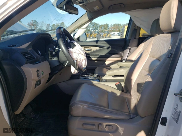 2020 Honda Ridgeline RTL-E with VIN 5FPYK3F77LB002473, listed as a Copart auction lot 77117414 with 62,631 mi miles and Salvage Title. Bid and sale history available at carsss.com. Image 7.