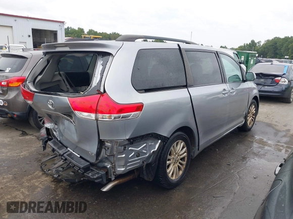 2012 Toyota Sienna XLE AAS with VIN 5TDYK3DC6CS243008, listed as a IAAI auction lot 40351580 with 157,752 mi miles and . Bid and sale history available at DreamBid. Image 4.