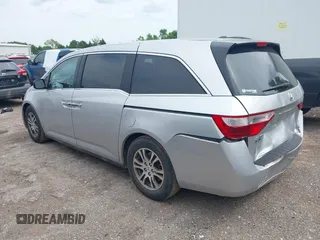 2012 Honda Odyssey EX-L with VIN 5FNRL5H66CB081323, listed as a IAAI auction lot 42465110 with 266,934 mi miles and . Bid and sale history available at DreamBid. Image 14.