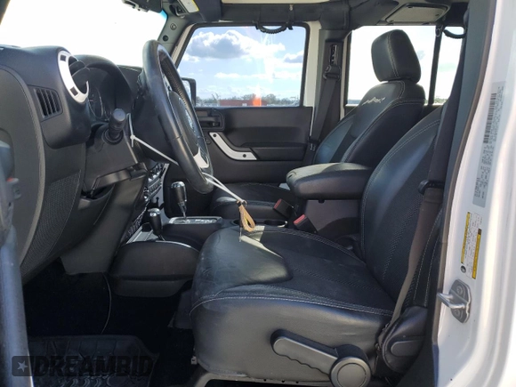 2015 Jeep Wrangler Unlimited Sahara with VIN 1C4BJWEG6FL614671, listed as a Copart auction lot 86052284 with 92,894 mi miles and Salvage title. Bid and sale history available at DreamBid. Image 7.