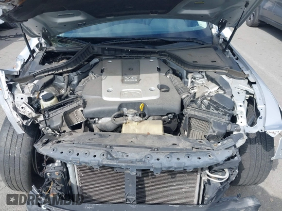 2014 Infiniti Q50 Premium z VIN JN1BV7AP9EM684709, wystawiony jako IAAI lot #41901877 z przebiegiem 91 425 mil mil oraz . Historia ofert i sprzedaży dostępna na DreamBid. Obrazek 10.