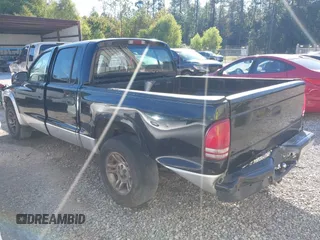2003 Dodge Dakota SLT with VIN 1D7HL48X93S151422, listed as a IAAI auction lot 40661577 with 238,586 mi miles. Bid and sale history available at carsss.com. Image 3.