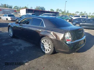 2012 Chrysler 300 C Luxury Series with VIN 2C3CCAPT3CH251755, listed as a IAAI auction lot 41935653 with 62,397 mi miles and . Bid and sale history available at carsss.com. Image 3.