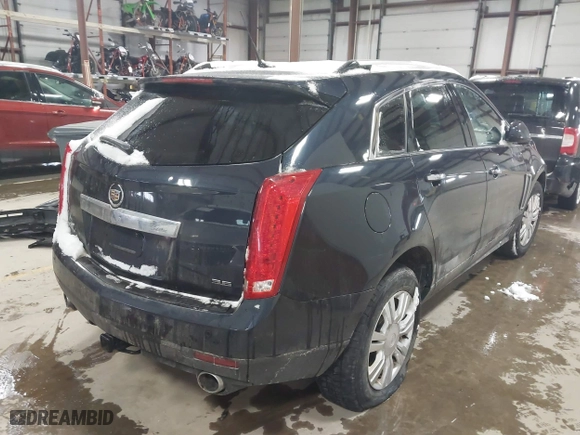 2014 Cadillac SRX Luxury Collection with VIN 3GYFNEE31ES561037, listed as a IAAI auction lot 41373540 with 126,108 mi miles. Bid and sale history available at carsss.com. Image 4.
