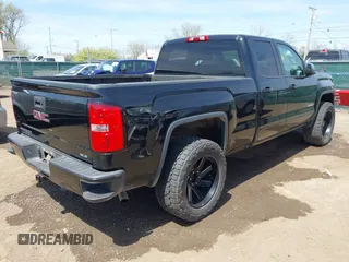 2017 GMC Sierra 1500 SLE z VIN 1GTV2MEC2HZ105964, wystawiony jako IAAI lot #42091941 z przebiegiem 93 779 mil mil oraz . Historia ofert i sprzedaży dostępna na DreamBid. Obrazek 4.