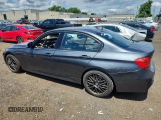 2014 BMW 3 Series 335i xDrive with VIN WBA3B9C58EJ466051, listed as a Copart auction lot 65060915 with Not provided miles and Salvage title. Bid and sale history available at DreamBid. Image 2.