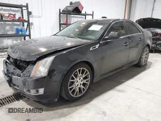 2013 Cadillac CTS Premium z VIN 1G6DS5E34D0103328, wystawiony jako IAAI lot #41501406 z przebiegiem 157 633 mil mil oraz . Historia ofert i sprzedaży dostępna na DreamBid. Obrazek 2.