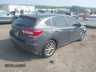 2018 Subaru Impreza with VIN 4S3GTAA63J3748319, listed as a IAAI auction lot 42441310 with 71,616 mi miles and . Bid and sale history available at DreamBid. Image 4.