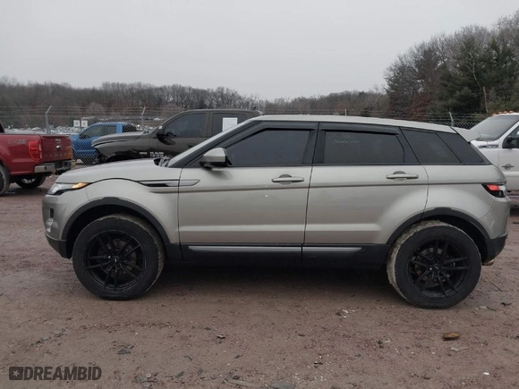 2014 Land Rover Range Rover Evoque Pure Plus with VIN SALVP2BG5EH893212, listed as a IAAI auction lot 41666759 with 158,489 mi miles. Bid and sale history available at carsss.com. Image 14.